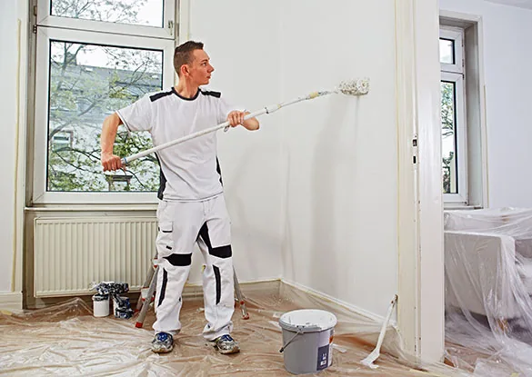 Maler an der Fassade